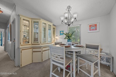 Welcome to your dream retreat in the serene community of Topsail on Topsail Green Golf Club in North Carolina - for sale on GolfHomes.com, golf home, golf lot