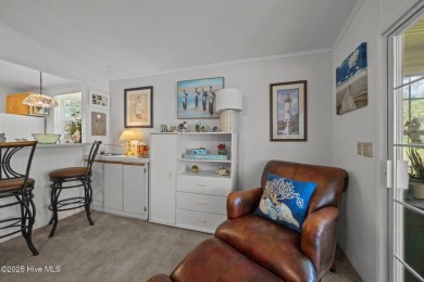 Welcome to your dream retreat in the serene community of Topsail on Topsail Green Golf Club in North Carolina - for sale on GolfHomes.com, golf home, golf lot