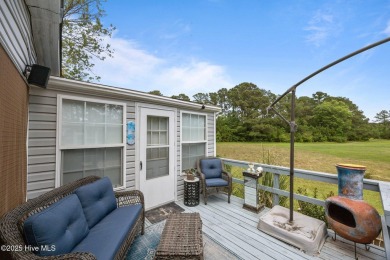 Welcome to your dream retreat in the serene community of Topsail on Topsail Green Golf Club in North Carolina - for sale on GolfHomes.com, golf home, golf lot