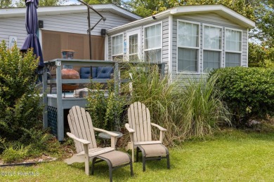 Welcome to your dream retreat in the serene community of Topsail on Topsail Green Golf Club in North Carolina - for sale on GolfHomes.com, golf home, golf lot