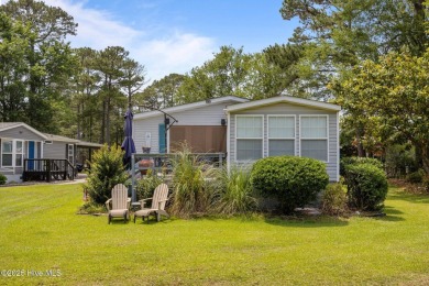 Welcome to your dream retreat in the serene community of Topsail on Topsail Green Golf Club in North Carolina - for sale on GolfHomes.com, golf home, golf lot