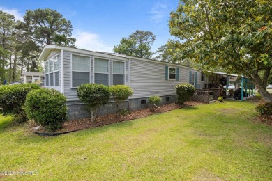 Welcome to your dream retreat in the serene community of Topsail on Topsail Green Golf Club in North Carolina - for sale on GolfHomes.com, golf home, golf lot