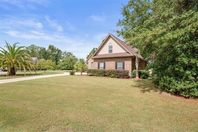 Meticulously maintained and truly move-in ready, this beautiful on Oak Grove Island Golf and Country Club in Georgia - for sale on GolfHomes.com, golf home, golf lot