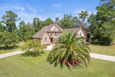 Meticulously maintained and truly move-in ready, this beautiful on Oak Grove Island Golf and Country Club in Georgia - for sale on GolfHomes.com, golf home, golf lot