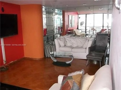 Experience luxury living in this stunning 2-bed, 2-bath tower on Turnberry Isle Resort and Club in Florida - for sale on GolfHomes.com, golf home, golf lot