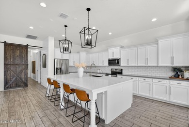 Discover modern comfort in this 4-bedroom, 3-bath Queen Creek on Las Colinas Golf Club in Arizona - for sale on GolfHomes.com, golf home, golf lot