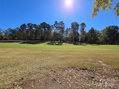 This golf course lot is located on the 10th fairway of the Old on Old North State Club at Uwharrie Point Golf community in North Carolina - for sale on GolfHomes.com, golf home, golf lot