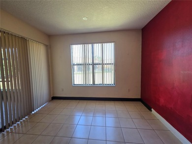 Auction Property. Delightful 2 bedroom, 2 bath home with a on Stonegate Golf Club in Florida - for sale on GolfHomes.com, golf home, golf lot