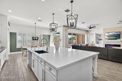 Discover modern comfort in this 4-bedroom, 3-bath Queen Creek on Las Colinas Golf Club in Arizona - for sale on GolfHomes.com, golf home, golf lot