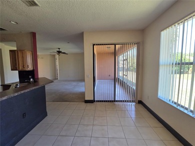 Auction Property. Delightful 2 bedroom, 2 bath home with a on Stonegate Golf Club in Florida - for sale on GolfHomes.com, golf home, golf lot