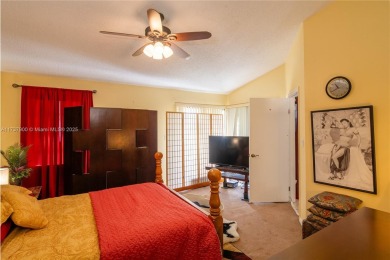This charming two-bedroom, two-bathroom townhouse offers a on Woodmont Country Club in Florida - for sale on GolfHomes.com, golf home, golf lot
