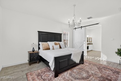 Discover modern comfort in this 4-bedroom, 3-bath Queen Creek on Las Colinas Golf Club in Arizona - for sale on GolfHomes.com, golf home, golf lot