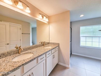 Recently purchased but never lived in! This beautiful 3-bedroom on The Grand Club - Pine Lakes Course in Florida - for sale on GolfHomes.com, golf home, golf lot