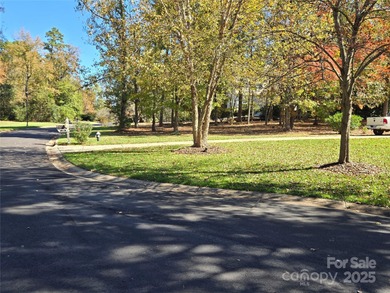 This golf course lot is located on the 10th fairway of the Old on Old North State Club at Uwharrie Point Golf community in North Carolina - for sale on GolfHomes.com, golf home, golf lot