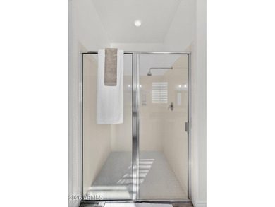 Discover modern comfort in this 4-bedroom, 3-bath Queen Creek on Las Colinas Golf Club in Arizona - for sale on GolfHomes.com, golf home, golf lot