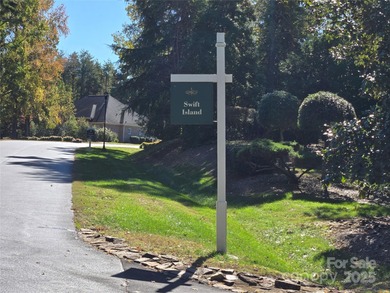 This golf course lot is located on the 10th fairway of the Old on Old North State Club at Uwharrie Point Golf community in North Carolina - for sale on GolfHomes.com, golf home, golf lot