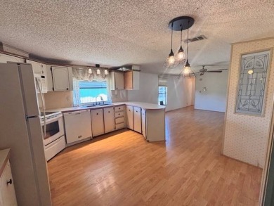 Welcome to your perfect year-round retreat! This charming 2 on Lake Henry Golf Club in Florida - for sale on GolfHomes.com, golf home, golf lot