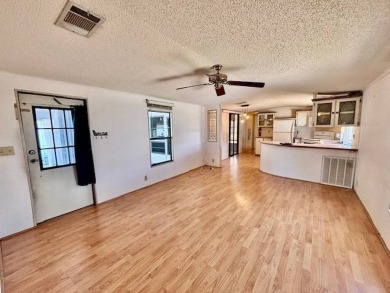 Welcome to your perfect year-round retreat! This charming 2 on Lake Henry Golf Club in Florida - for sale on GolfHomes.com, golf home, golf lot