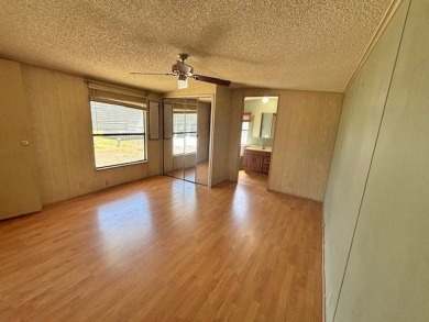 Welcome to your perfect year-round retreat! This charming 2 on Lake Henry Golf Club in Florida - for sale on GolfHomes.com, golf home, golf lot