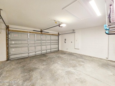 Recently purchased but never lived in! This beautiful 3-bedroom on The Grand Club - Pine Lakes Course in Florida - for sale on GolfHomes.com, golf home, golf lot