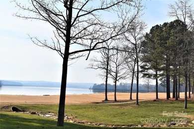This golf course lot is located on the 10th fairway of the Old on Old North State Club at Uwharrie Point Golf community in North Carolina - for sale on GolfHomes.com, golf home, golf lot