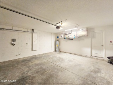 Recently purchased but never lived in! This beautiful 3-bedroom on The Grand Club - Pine Lakes Course in Florida - for sale on GolfHomes.com, golf home, golf lot