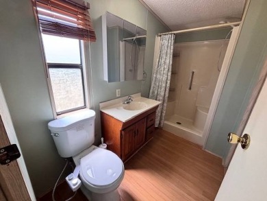 Welcome to your perfect year-round retreat! This charming 2 on Lake Henry Golf Club in Florida - for sale on GolfHomes.com, golf home, golf lot