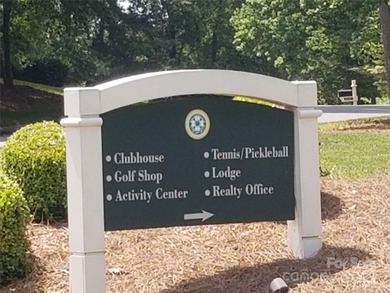 This golf course lot is located on the 10th fairway of the Old on Old North State Club at Uwharrie Point Golf community in North Carolina - for sale on GolfHomes.com, golf home, golf lot
