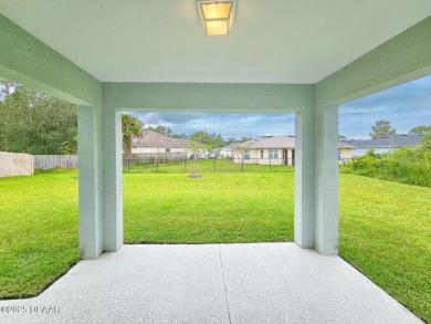 Recently purchased but never lived in! This beautiful 3-bedroom on The Grand Club - Pine Lakes Course in Florida - for sale on GolfHomes.com, golf home, golf lot