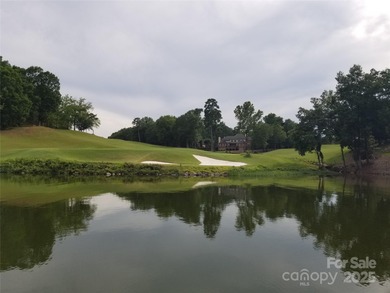 This golf course lot is located on the 10th fairway of the Old on Old North State Club at Uwharrie Point Golf community in North Carolina - for sale on GolfHomes.com, golf home, golf lot
