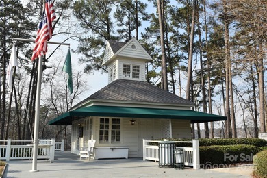 This golf course lot is located on the 10th fairway of the Old on Old North State Club at Uwharrie Point Golf community in North Carolina - for sale on GolfHomes.com, golf home, golf lot