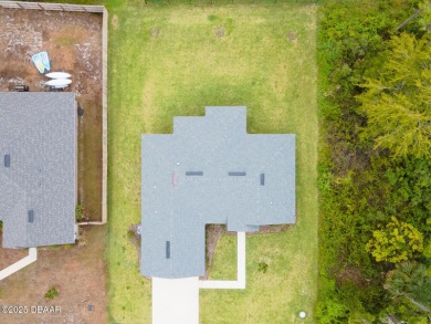 Recently purchased but never lived in! This beautiful 3-bedroom on The Grand Club - Pine Lakes Course in Florida - for sale on GolfHomes.com, golf home, golf lot