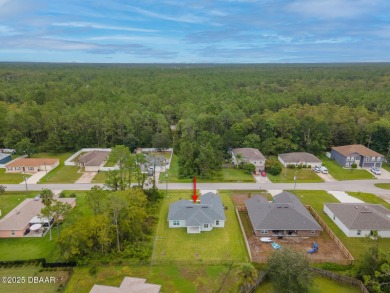 Recently purchased but never lived in! This beautiful 3-bedroom on The Grand Club - Pine Lakes Course in Florida - for sale on GolfHomes.com, golf home, golf lot