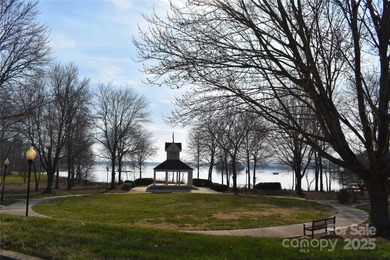 This golf course lot is located on the 10th fairway of the Old on Old North State Club at Uwharrie Point Golf community in North Carolina - for sale on GolfHomes.com, golf home, golf lot