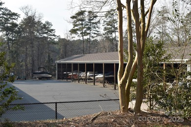 This golf course lot is located on the 10th fairway of the Old on Old North State Club at Uwharrie Point Golf community in North Carolina - for sale on GolfHomes.com, golf home, golf lot