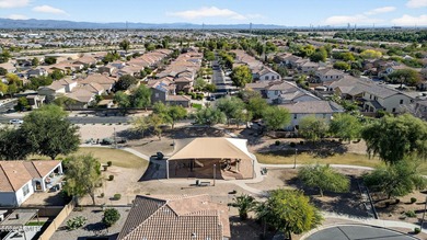 Discover modern comfort in this 4-bedroom, 3-bath Queen Creek on Las Colinas Golf Club in Arizona - for sale on GolfHomes.com, golf home, golf lot