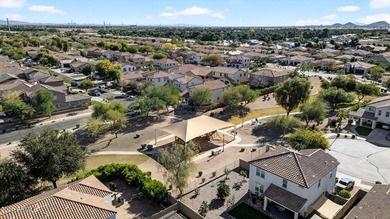 Discover modern comfort in this 4-bedroom, 3-bath Queen Creek on Las Colinas Golf Club in Arizona - for sale on GolfHomes.com, golf home, golf lot