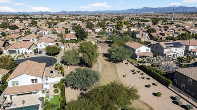 Discover modern comfort in this 4-bedroom, 3-bath Queen Creek on Las Colinas Golf Club in Arizona - for sale on GolfHomes.com, golf home, golf lot