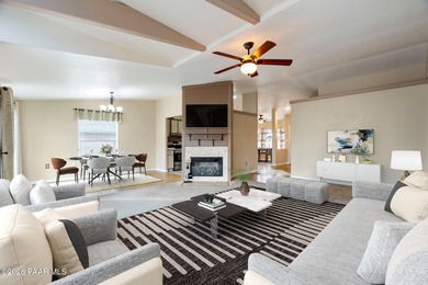 Set on a generous corner homesite in the desirable 55+ Villages on Quail Wood Greens Golf Course in Arizona - for sale on GolfHomes.com, golf home, golf lot