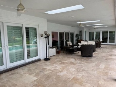 Spacious 3 bed, 3 full bath estate style home with a large on Turtle Creek Club in Florida - for sale on GolfHomes.com, golf home, golf lot