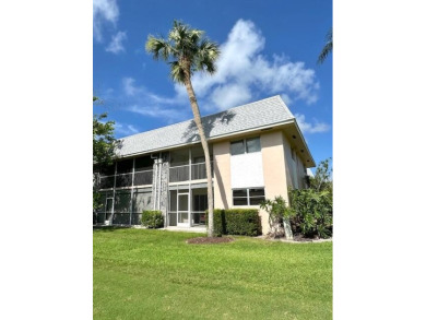 Come see this beautiful first floor end unit in charming on The Little Club in Florida - for sale on GolfHomes.com, golf home, golf lot