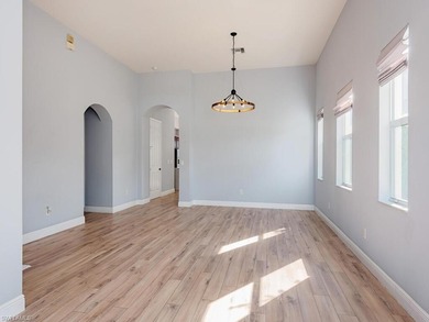 Beautifully Updated Estate Home with Scenic Lake View!  This on Valencia Golf and Country Club in Florida - for sale on GolfHomes.com, golf home, golf lot