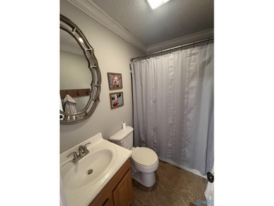 Gorgeous 4 bedroom home on a corner lot inside Arab city limits! on Twin Lakes Golf Course in Alabama - for sale on GolfHomes.com, golf home, golf lot