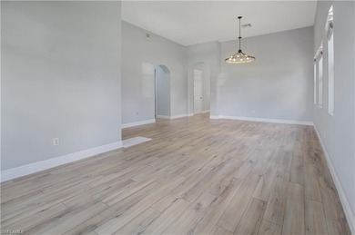 Beautifully Updated Estate Home with Scenic Lake View!  This on Valencia Golf and Country Club in Florida - for sale on GolfHomes.com, golf home, golf lot