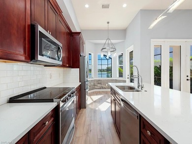 Beautifully Updated Estate Home with Scenic Lake View!  This on Valencia Golf and Country Club in Florida - for sale on GolfHomes.com, golf home, golf lot