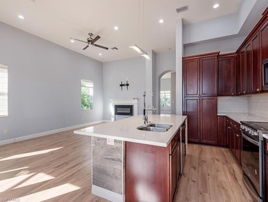 Beautifully Updated Estate Home with Scenic Lake View!  This on Valencia Golf and Country Club in Florida - for sale on GolfHomes.com, golf home, golf lot