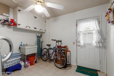 Enjoy this well-maintained Gemini Twin duplex across from on PalmBrook Country Club in Arizona - for sale on GolfHomes.com, golf home, golf lot