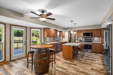 Welcome to this fully renovated and spacious 5-bedroom on Bliss Creek Golf Club in Illinois - for sale on GolfHomes.com, golf home, golf lot