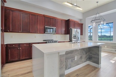 Beautifully Updated Estate Home with Scenic Lake View!  This on Valencia Golf and Country Club in Florida - for sale on GolfHomes.com, golf home, golf lot