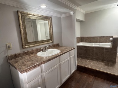 Gorgeous 4 bedroom home on a corner lot inside Arab city limits! on Twin Lakes Golf Course in AL - for sale on GolfHomes.com, golf home, golf lot